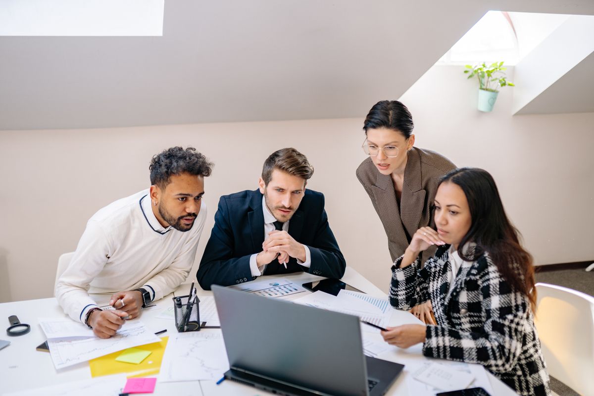 Marketing team reviewing traffic tools and software stack together